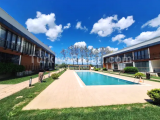 ARTI GAYRİMENKUL'DEN PORTO MARE2'DE HAVUZ VE DENİZ MANZARALI 2+1