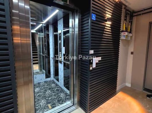 KIZILARIK MAHALLEDE KATTA ASANSORLU LÜX DAIRE KREDILI HARIKA KONUMDA