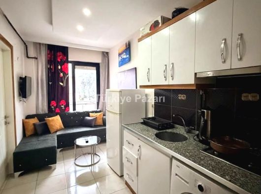 ÜNİVERSİTEYE YAKIN ÖĞRETMEN EVİ ALTI 1+1 BALKONLU KİRALIK APART