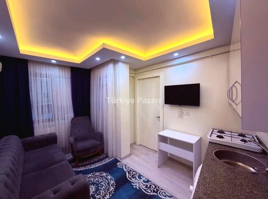 ÇINARDA ÖN CEPHE BALKONLU EŞYALI FIRSAT 1+1 SATILIK APART