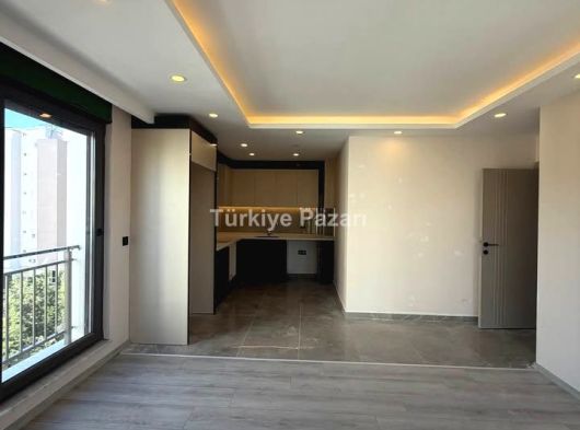 ANTALYA KEPEZ GÖÇERLER MAHALLESİN DE SATILIK YERDEN ISITMALI 2+1 ABD MUTFAK DAİRELER