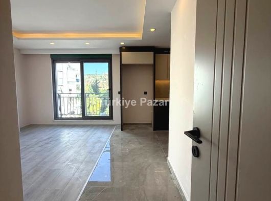ANTALYA KEPEZ GÖÇERLER MAHALLESİN DE SATILIK YERDEN ISITMALI 2+1 ABD MUTFAK DAİRELER
